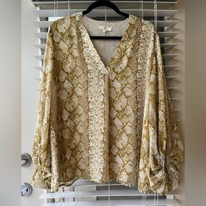 Mustard colored snake print top